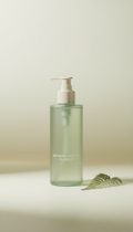 Botanical Renewal Cleanser, Products shot at 3/4 angle on softly textured off-white surfaces (soft porcelain or pale...